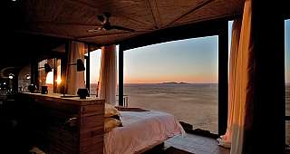 Luxury accommodation Desert Whisper, sunset view of Namib Desert, Namibia