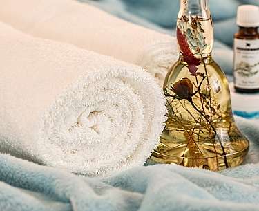A cozy towel and massageoil A cozy towel and massageoil