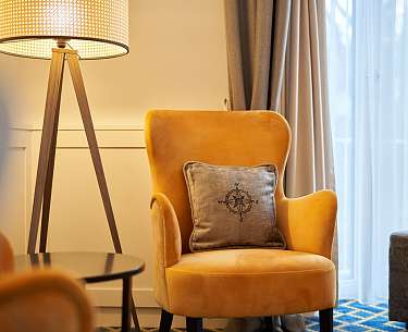 yellow armchair in the superior class single room  yellow armchair in the superior class single room